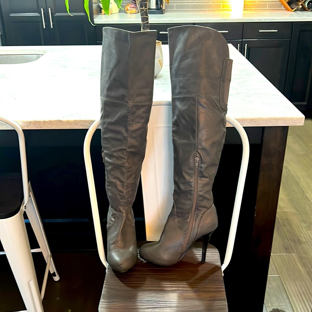 Thigh high heeled boots